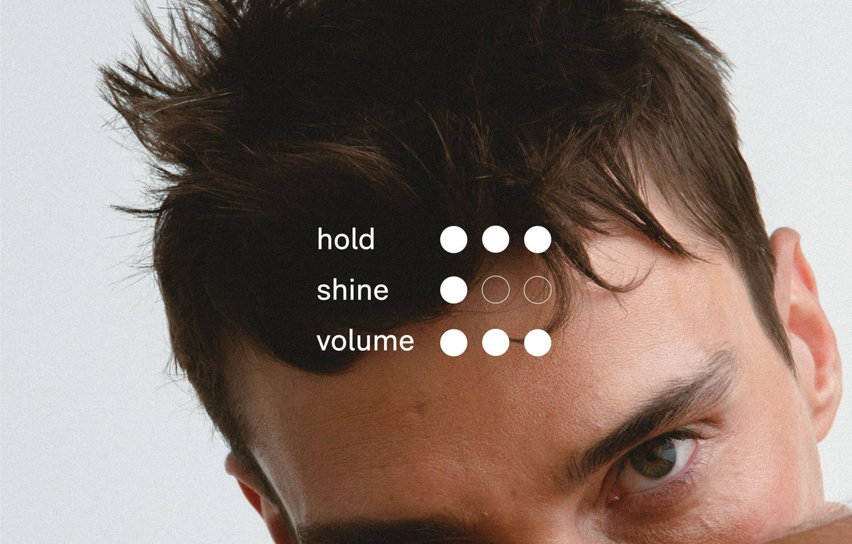 Close-up of a person with text overlay on hair styling features.