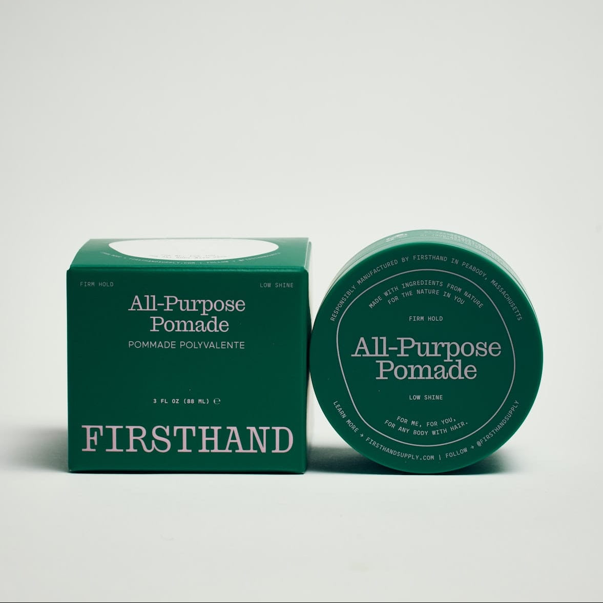 Green container of All-Purpose Pomade with matching box on a white background